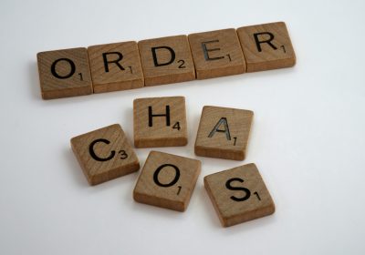 A picture with the words Order and Chaos