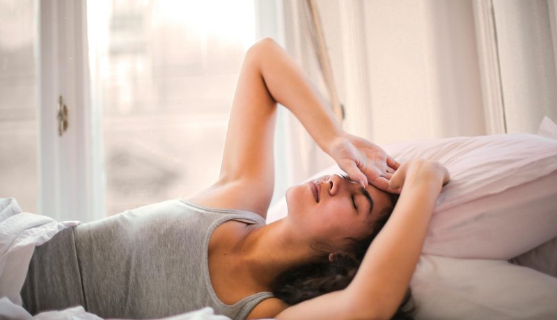 Own Your Day, Own Your Life: A Practical Guide to Win Your Morning A woman waking up with hands on her head