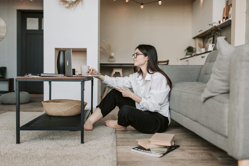 A woman working on a laptop