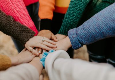 People Holding Hands Together