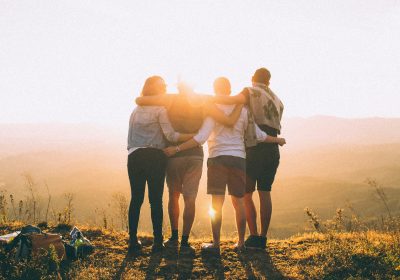 The Power of Sharing: How Generosity Builds Relationship and Fosters Personal Growth Friends Hugging Each Other