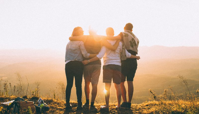 The Power of Sharing: How Generosity Builds Relationship and Fosters Personal Growth Friends Hugging Each Other