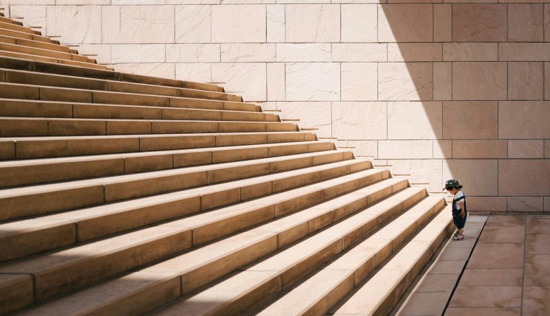 boy climbing stairs